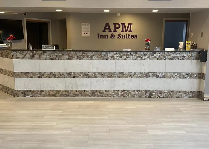 Apm Inn & Suites